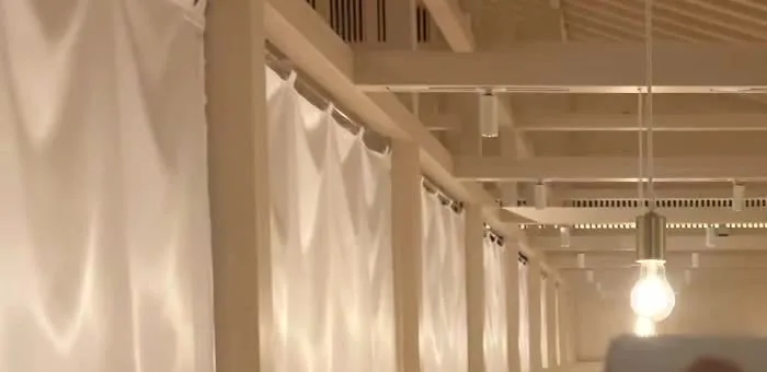 Warm, zone-dimmed lighting in a commercial dining restaurant